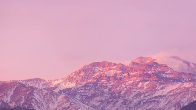 Timelapse of Andes mountains at dusk. Chile