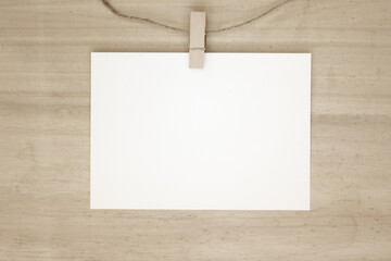 Blank paper on wood background