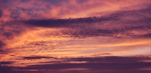 Fototapeta na wymiar pink turning orange with purple at sunset