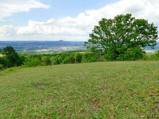 Fototapeta na wymiar Panoramic view of the Celtic grave hill Burren to the famous hill Hohenstaufen in Germany