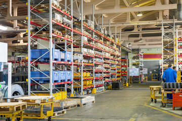 Factory warehouse steel reinforcement. High stacked shelving.