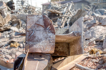 Destroyed and cut I-beam steel beams.