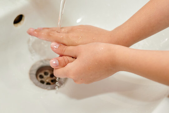 washing hands with soap under the tap. There is no pandemic.