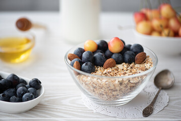 breakfast with blueberry and yellow cherries oatmeal