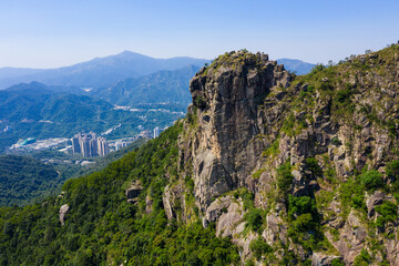 Fototapeta na wymiar Hong Kong lion rock mountain from blue sky