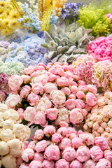 Fototapeta premium Floral carpet or Wallpaper. Background of mix of flowers. Beautiful flowers for catalog or online store. Floral shop and delivery concept. Top view. Copy space