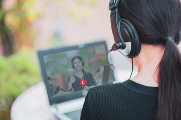 Women Call center support working from home,New normal technology device