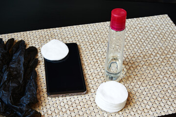 Napkin and sanitizer for wiping your smartphone