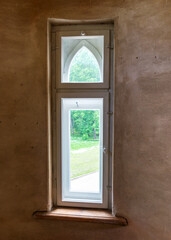 a window on the wall, the light comes from outside, different shadows