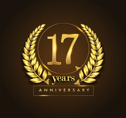 17th gold anniversary celebration logo with golden color and laurel wreath vector design.