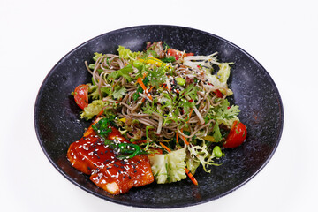 japanese soba noodle salad with teriyaki sauce glazed salmon.