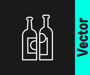 White line Bottles of wine icon isolated on black background. Vector Illustration.