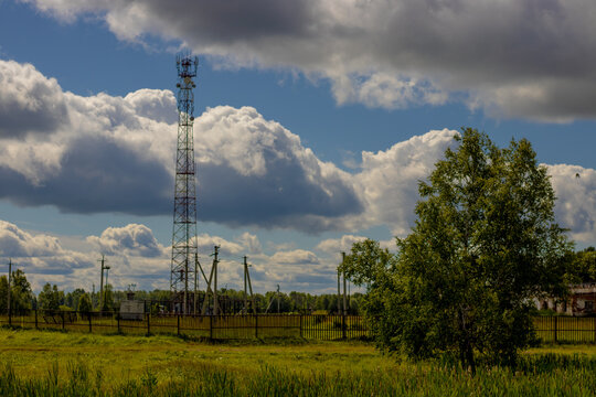  5G tower in the village, beautiful sky and clouds