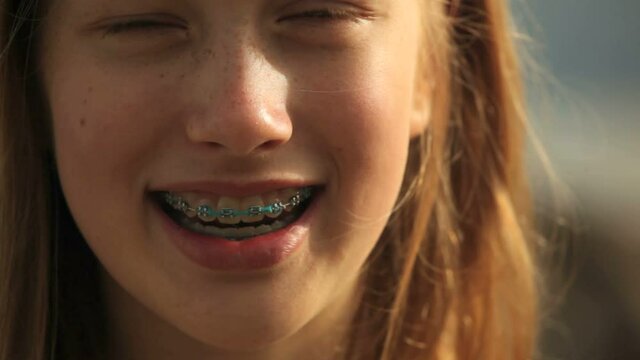 Portrait of a young girl with braces