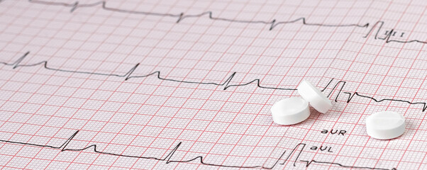Close up Electrocardiogram with pills. Medical concept. Selective focus