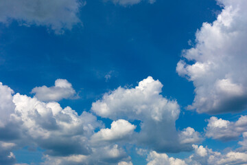 Obraz na płótnie Canvas Gray clouds on blue sky background.