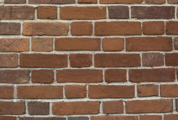 Texture of a red brick building wall