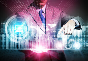 Businessman touching colorful hologram of city