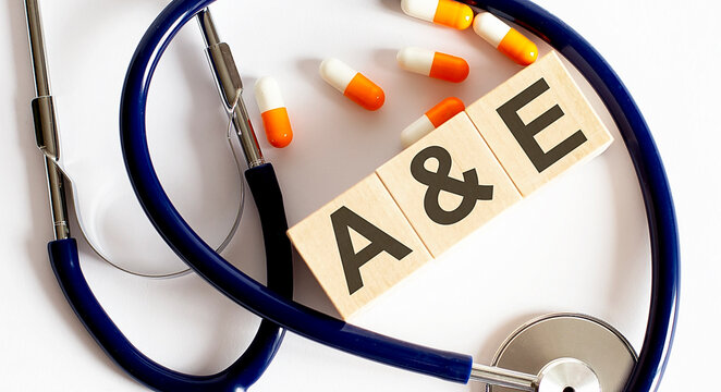 Beautiful stethoscope with pills .Wooden blocks A&E