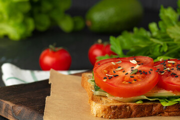 Sandwich with cream cheese, tomatoes and lettuce