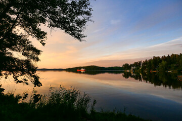 Fototapeta na wymiar Stockholm, Sweden A cement carrying ship on Lake Malaren at dawn.