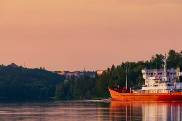 Stockholm, Sweden A cement carrying ship on Lake Malaren at dawn.