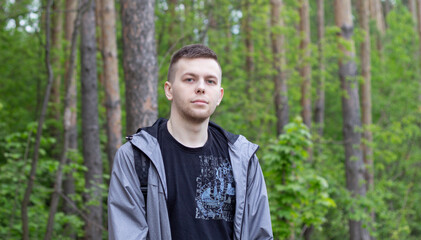 young man in a forest