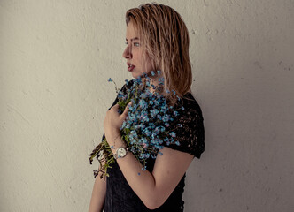 girl with white hair with the flower in hands