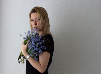 girl with white hair with the flower in hands