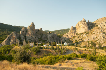 Naklejka na ściany i meble Mountain Rock With Winery Sunny Valley In Sunny Day In Summer In Crimea, Russia.