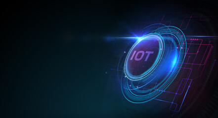 Internet of things - IOT concept. Businessman offer IOT products and solutions. Young businessman  select the abstract chip with text IoT on the virtual display.