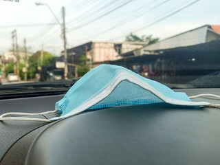 surgery mask in the car.