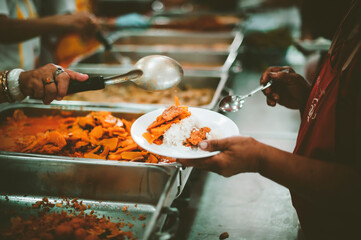 Donate food to the poor : concept Sharing Food With Homeless