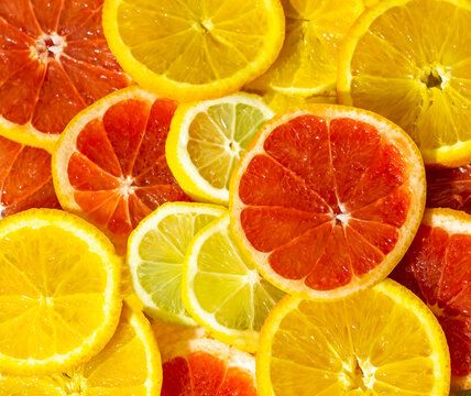 citrus fruit background, citrus fruit slices, background of colorful citrus fruits