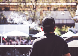 Man smoking outdoors