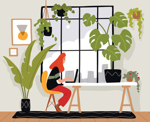 Young female freelancer is working on a computer, sitting at the table. Artist, designer, freelancer, student.