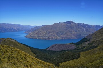 Naklejka na ściany i meble Stunning views from Ben Lomond Summit hiking trail in South Island, New Zealand