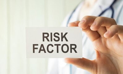 Risk Factor card in hands of Medical Doctor