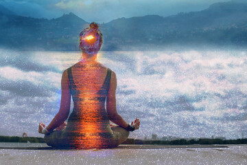 Yoga day concept. Multiple exposure image. Sun path and lotus asana.