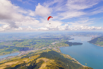 Paraglider above Lake Zug (Zugersee) seen from Mount Rigi, Lucerne, Switzerland.