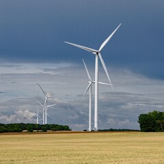 Wind turbines in a field of ripe wheat