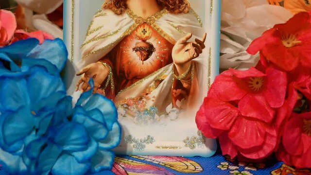 icon of Jesus Christ with heart,Jesus Christ with outstretched arms with a heart in flowers