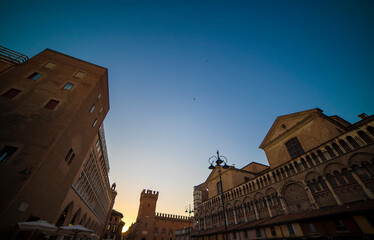 The sunset in Piazza Trento E Tieste with the Cathedral in the city of Ferrara Italy Europe