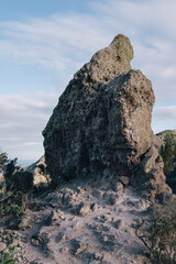 Aerial View of Tenerife overlooking a green mountain valley with a ocean view