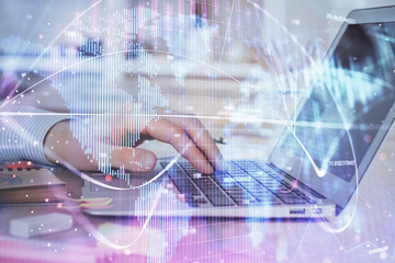 Multi exposure of businessman working on laptop on background. International business hologram in front. Concept of success.