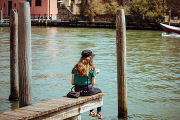 young woman on the pier