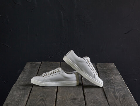 white shoes on a wooden