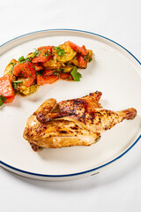 chicken with roasted vegetables on the white