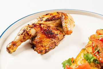 chicken with roasted vegetables on the white