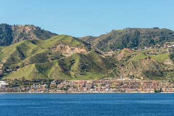 The Strait of Messina is a narrow strait between the eastern tip of Sicily and the western tip of Calabria in the south of Italy. It connects the Tyrrhenian Sea to with the Ionian Sea.